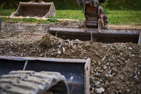 Digger ( digger bucket) at construction Stock Photos