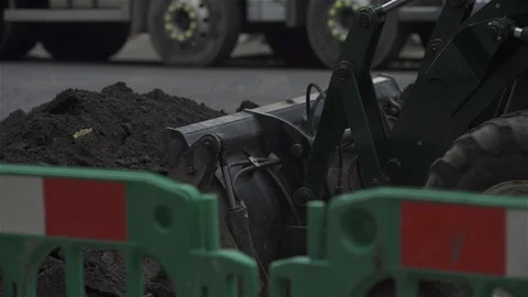 Digger excavating and moving earth close up Stock Footage 93207619
