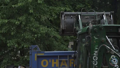 Digger excavator - backing up and turning Stock Footage 93207591