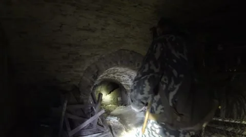 Digger explores the Turkish underground tunnel. Video stock 58452811