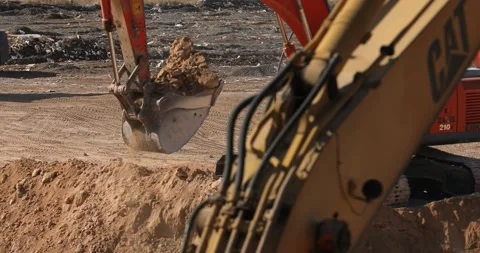 Digger loading soil - close up (4K) Stock Footage 166843439