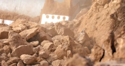 Digger loading soil - close up (4K) Stock Footage 166843778