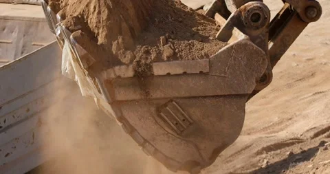 Digger loading track with soil (4K) Stock Footage 166843384