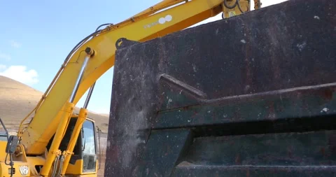 Digger is loading track soil (4K) Stock Footage 166843749
