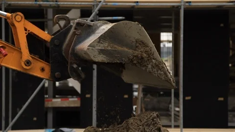 Digger Pouring Ground in an Office Building Site in the Netherlands Stock Footage 95847943