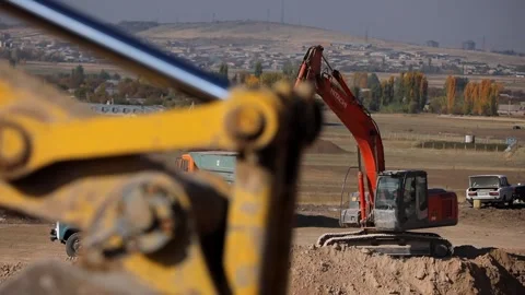 Diggers are working and loading tracks Stock Footage 167052770