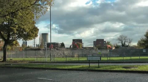 Diggers at Industrial demolition site Stock Footage