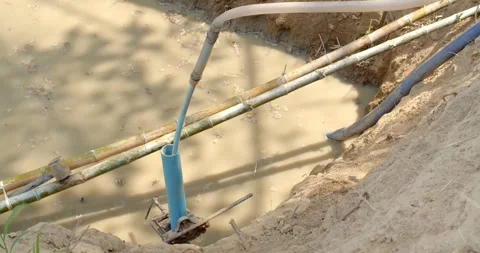 Digging an artesian well.Drilling into the soil to find water. Stock Footage 274752569