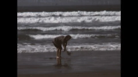 Digging for Clams 1972 Stock Footage 275846651