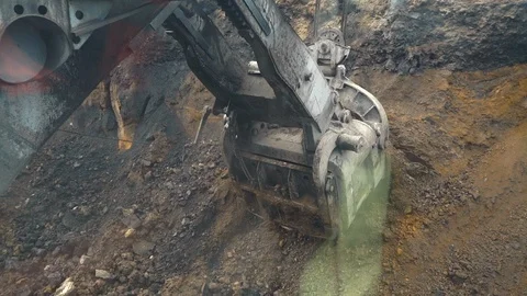 Digging clay with a large excavator in a coal mine. view from the cabin Stock Footage 106914417