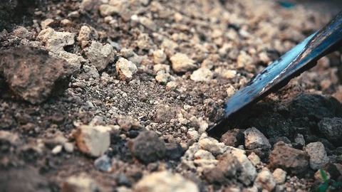 Digging ground with a shovel close up Stock Footage 90263925