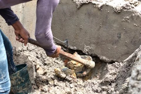 Digging a hole in construction site 写真素材