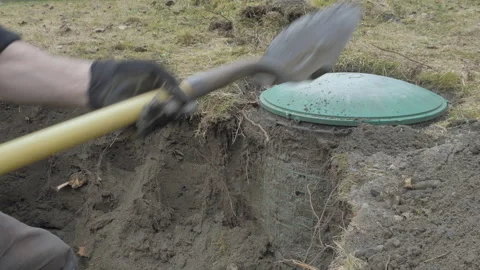 Digging Out Septic Tank in Yard with Shovel Video stock 233379529