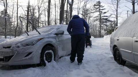 Digging out from snowstorm Stock Footage 34630153