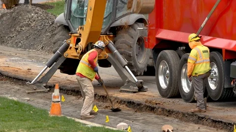 Digging pipe line construction close up Stock Footage 106365183