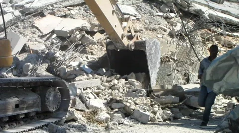 Digging in the Rubble - Earthquake (HD) m Stock Footage 619548