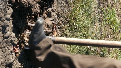 Digging spring earth soil in garden with pitchfork Stock Footage 91164090