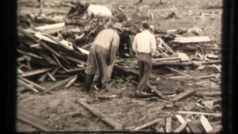 Digging Through Debris After a Tornado Disaster in Oklahoma, Natural Weather Video stock 130174370