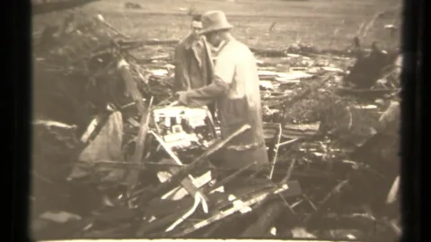Digging Through Rubble After a Tornado Disaster in Oklahoma, Natural Weather Stock Footage 130174152