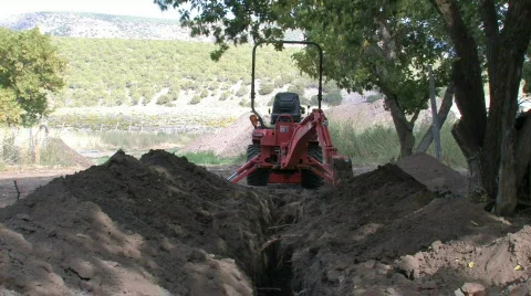 Digging a trench with backhoe FAST M HD Stock-Footage 263888