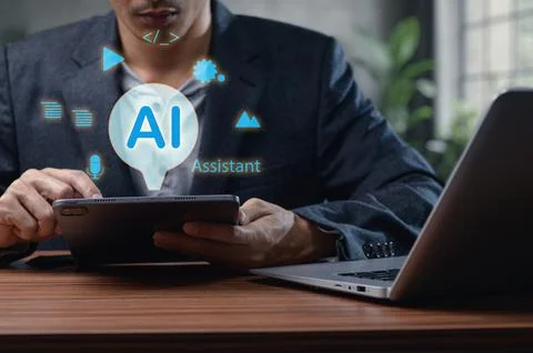 Digital AI Assistant Concept on Virtual Screen in a Modern Workspace Stock Photos