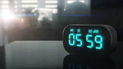 Digital alarm clock shows 6 am on the screen and wakes with loud ring sound Stock Footage 145118145
