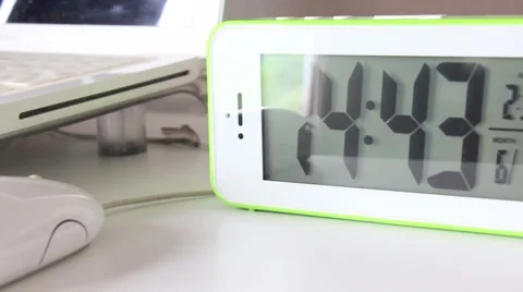 Digital Alarm Clock On The Table Video stock 65816094