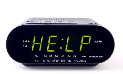 Digital alarm clock with the word help Stock Photos