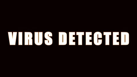 Digital alert text VIRUS DETECTED flashing on black screen with cinematic m.. Stock Footage 344282563