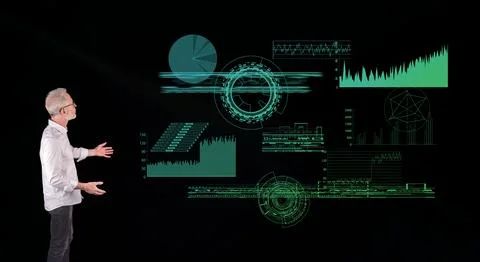 A digital analytics concept explained by a businessman on a wall screen Stock Photos