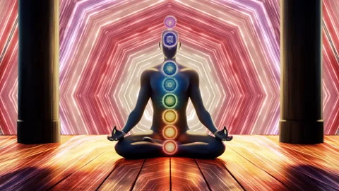 Digital animation of a meditating figure with visible chakras Stock Footage 321485846