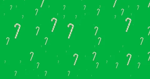 Digital animation of multiple candy cane icons in seamless pattern against black Stock Footage 318815683