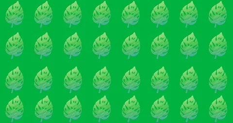 Digital animation of multiple green leaf icons in seamless pattern against black Stock Footage 318999879