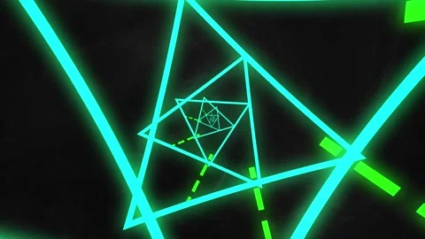 Digital animation of neon green triangular tunnel with copy space on black Stock Footage 329976572