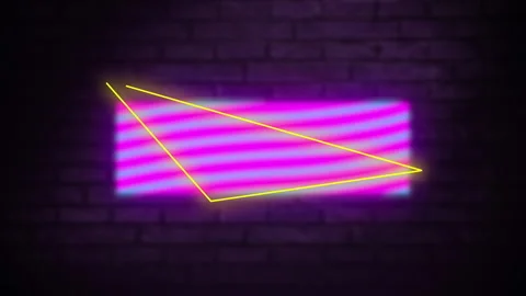 Digital animation of neon triangle shape over rectangle against grey brick wall Stock Footage 142198940