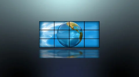 Digital animation of planet earth rotating, viewed on a bank of video screens. 動画素材 32963121
