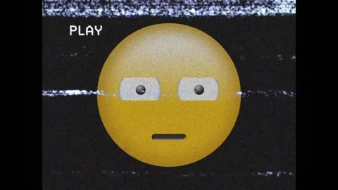 Digital animation of vhs glitch effect over confused face emoji against black Stock Footage 328455444