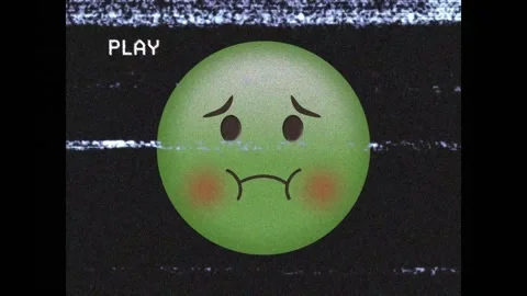 Digital animation of vhs glitch effect against puking face emoji against black Stock Footage 330583255