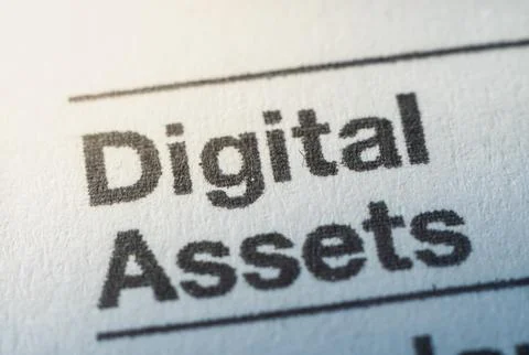 Digital assets reporting on US 1040 form for individual income tax return in Stock Photos