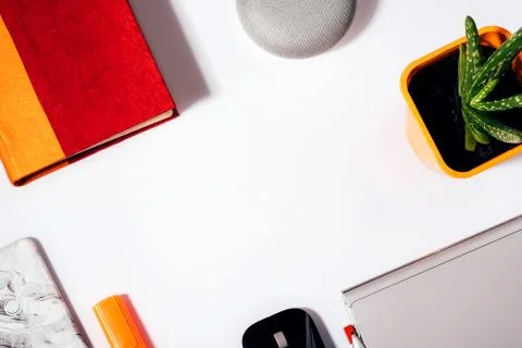 Digital Assistant concept. Flat lay of smart speaker with LED lights activated Stock Photos