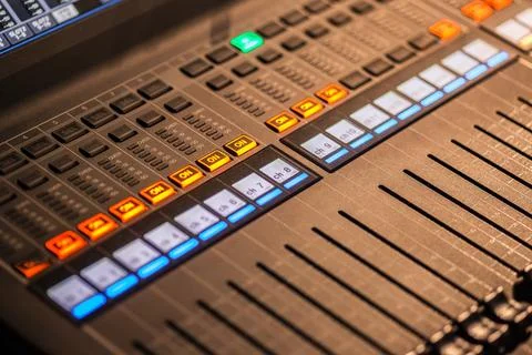 Digital audio mixing console with illuminated controls Stock Photos