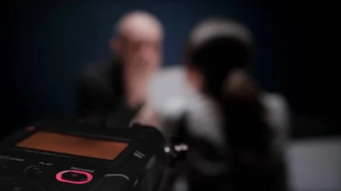 Digital audio voice dictaphone, blinking record button, closeup. Female Police Stock Footage 253469972