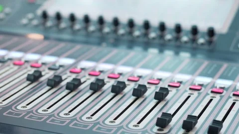 Digital audio workstation with an audio console. Soundboard knobs. Close up. DOF 스톡 동영상 76908303