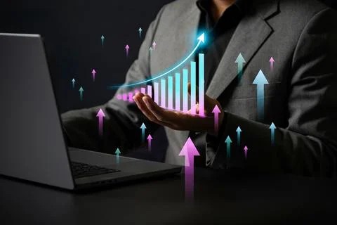 Digital bar chart visualization controlled by a hand near a laptop device i.. 스톡 사진