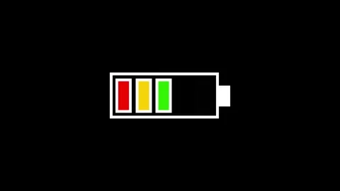 Digital battery icon charging from empty to full on black background Video stock 340156070
