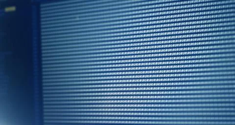 Digital binary code data on computer screen. Hacker concept background. Stock Photos