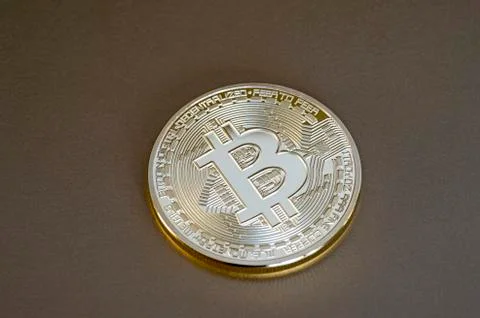 Digital bitcoin on a bronze background. Background. Stock-Fotos