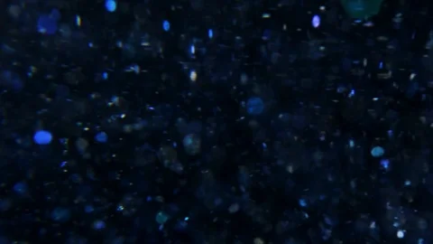 Digital blue glitter background on dark Stock Footage 107628704