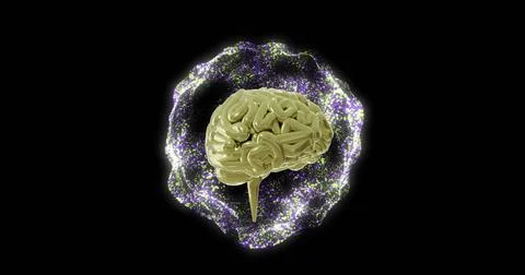 Digital brain surrounded by glowing particles, representing artificial Foto stock