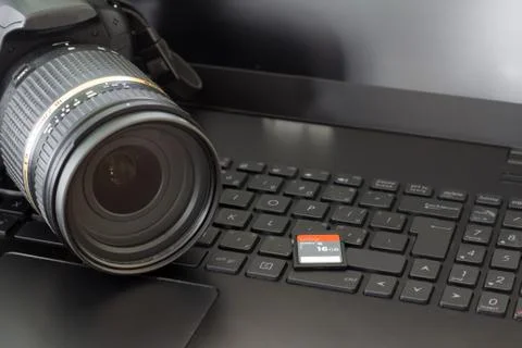Digital camera and laptop Stock Photos